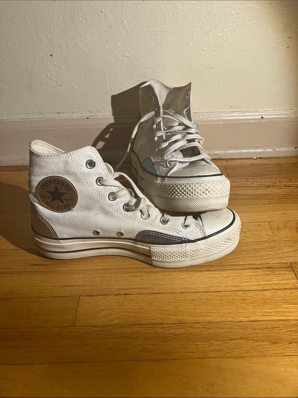 Converse White High-Top Sneakers with Brown Patch and Blue Accent